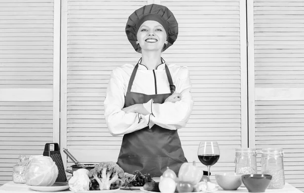 Woman pretty chef wear hat and apron. Delicious and easy recipes. Best culinary recipes to try at home. Lady adorable chef teach culinary arts. Professional culinary tips. Culinary show concept — Stock Photo, Image