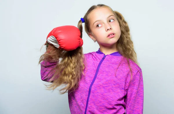Skill of successful leader. Girl cute child with red gloves posing on white background. Sport upbringing for leader. Cute kid with sport boxing gloves. Boxing sport for female. Sport upbringing — Stock Photo, Image
