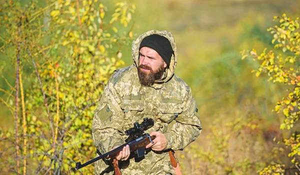 Experience and practice lends success hunting. Hunting season. Harvest animals typically restricted. Guy hunting nature environment. Bearded hunter rifle nature background. Hunting hobby concept — Stock Photo, Image