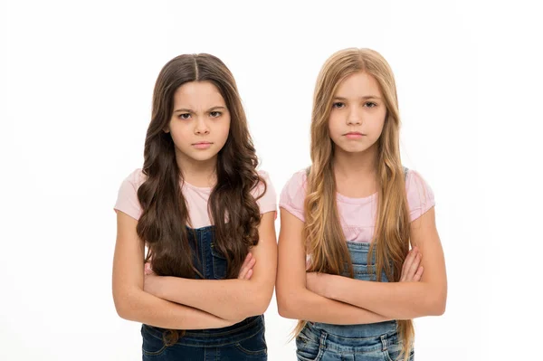 Sisters little kids isolated white background. Sisterly relationship. Sisterhood happiness and issues. Girls confident sisters. Sisterhood support or competition. Siblings relations. Sisterhood goals — Stock Photo, Image