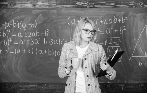 Find time to relax and stay positive. Keep positive attitude to work. Woman with tea cup chalkboard background. Prevent burnout concept. Time to relax. Teacher drink tea or coffee and stay positive — Stock Photo, Image