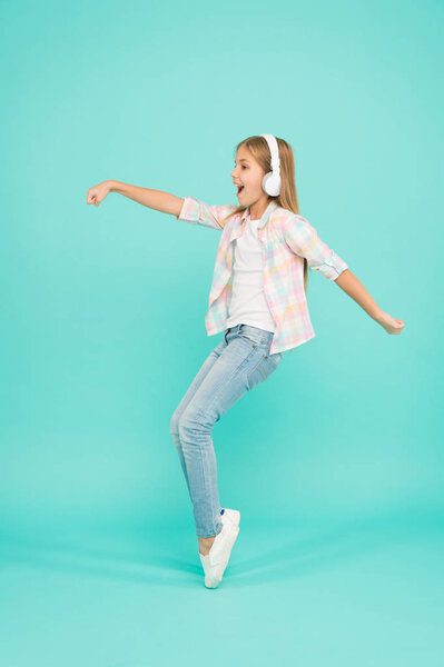 Music drives me dance. Girl child listen music with modern headphones. Kid little girl listen song headphones. Music account playlist. Customize your music. Listen track for dancing. Dancing school