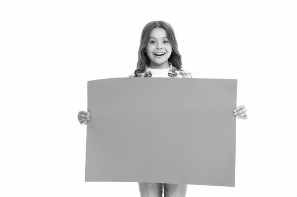 Girl kid hold blank surface copy space. Advertisement concept. Child cute girl happy carries blue paper place for advertisement. Kid cheerful sincere recommendation. Children market advertisement