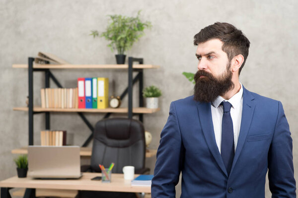 Man bearded serious office background. Provide consultation to management on strategic staffing plans. Office staff. HR director. HR management. HR job description. Head of human resources department