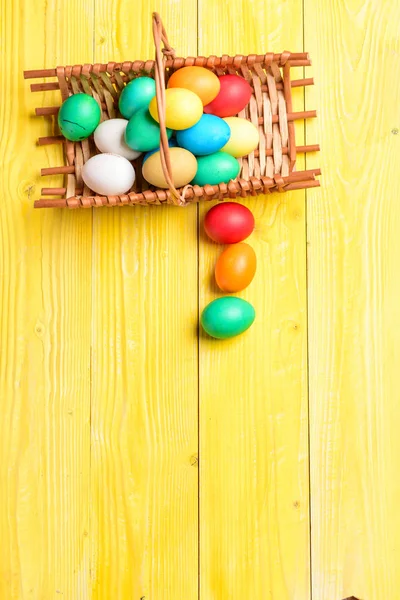 Colorful eggs in basket. Healthy and happy holiday. Spring holiday. Holiday celebration, preparation. Happy easter. painted eggs in egg tray. Egg hunt. copy space. Pleasant time spending