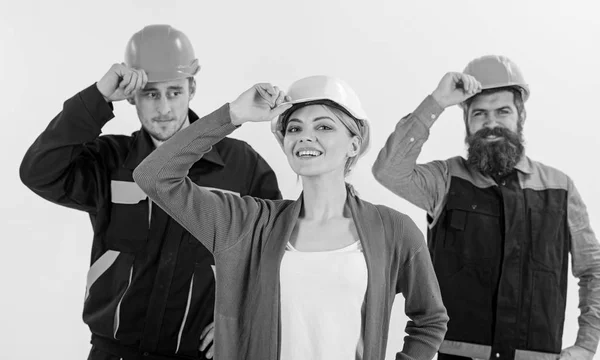 Team work concept. Builder, engineer, labourer, repairman as friendly team.