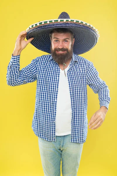 Mexican bearded guy ready to celebrate. Customs and traditions. Man wear sombrero mexican hat. Vacation travel festival and holidays. Join fest. Mexican culture concept. Celebrate mexican holiday.