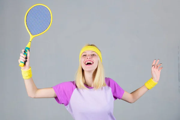 Tennis sport and entertainment. Active leisure and hobby. Girl fit slim blonde play tennis. Active lifestyle. Woman hold tennis racket in hand. Tennis club concept. Sport for maintaining health