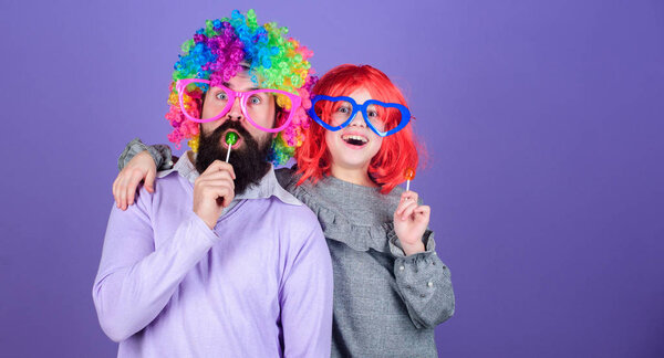 How crazy is your father. Easy simple ways be fun playful parent. Man bearded father and girl wear colorful wig while eat lollipop candy. Thing loving father do for children. Tribute to fun dad