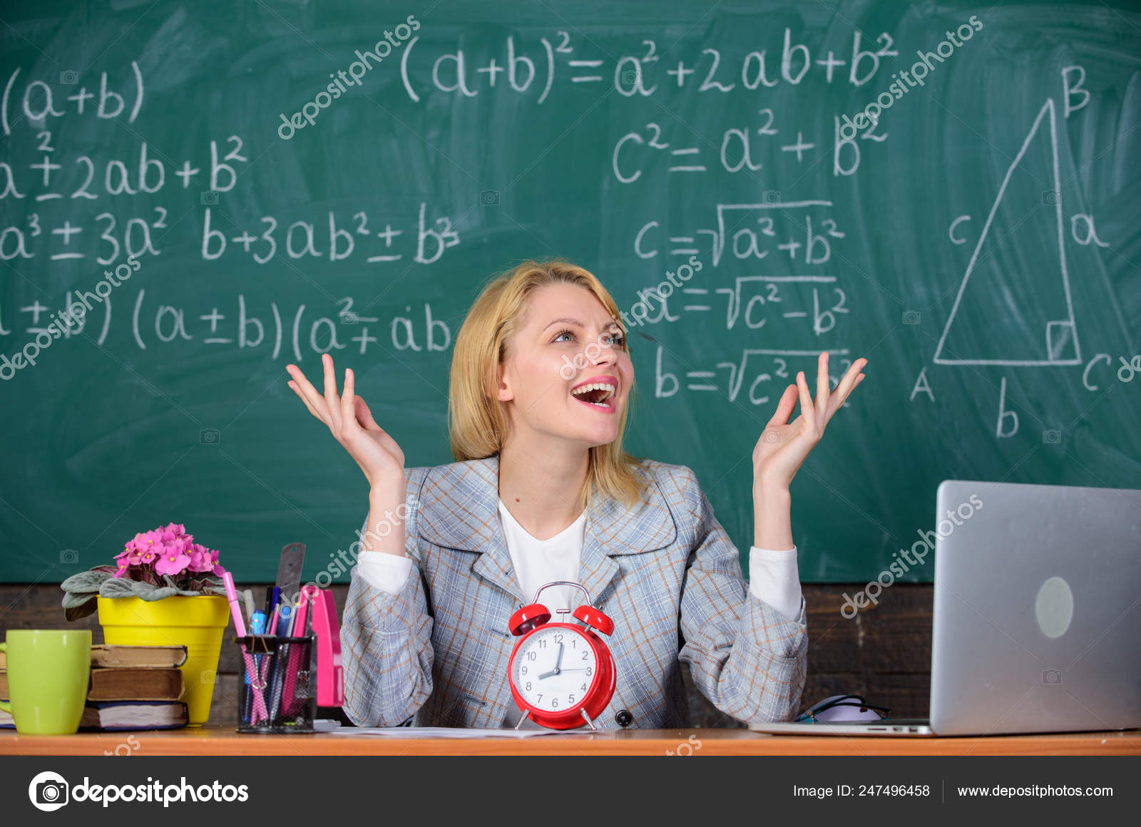 School. Home schooling. happy woman. teacher with clock at blackboard