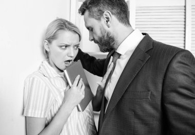 Businessman Sexually Harassing Female Colleague. Sexual harassment between colleagues and flirting in office. Victim of sexual assault and harassment at workplace. clipart