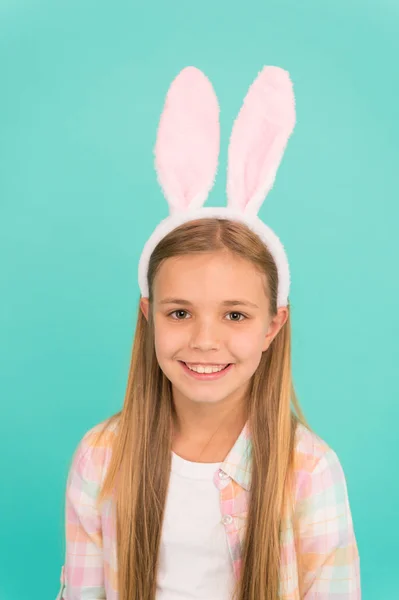 Happy childhood. Traditions for kids to help get in easter spirit. Bunny ears accessory. Easter activities. Cute bunny. Holiday bunny girl posing with cute long ears. Child smiling play bunny role — Stock Photo, Image
