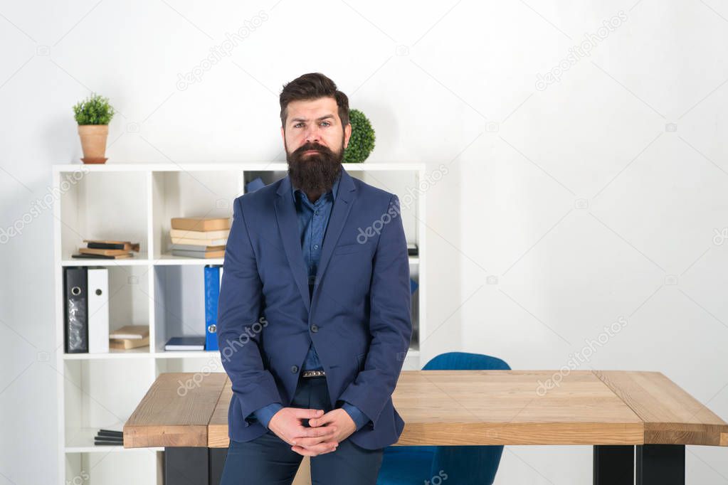 I am listening. Report and complaint concept. Man bearded hipster boss looking at you with attention. Ready to hear your opinion. Boss standing in office. Boss receive complaints. Meeting with boss