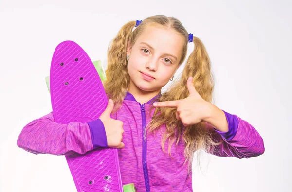 Penny board of her dream. Choose skateboard that looks great and also rides great. Best gift for kid. Kid long hair carry penny board. Plastic skateboards for everyday skater. Child hold penny board — Stock Photo, Image