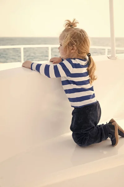 Child enjoy vacation on cruise ship. Vacation whole family enjoy. Family vacation cruise ship all inclusive tour. Kid boy toddler travelling sea cruise. Child in striped shirt looks like young sailor — Stock Photo, Image