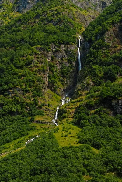 Crystal water. Source crystal clear water in pristine nature. Refreshment and moisturize. Waterfall crystal clear water high mountains Homersvag. Waterfall natural water source in green forest — Stock Photo, Image