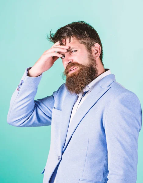 Need to think. Man disgusted doubtful face thinking. Have some doubts. Hipster bearded face not sure in something. Doubtful bearded man on blue background. Doubtful emotional expression