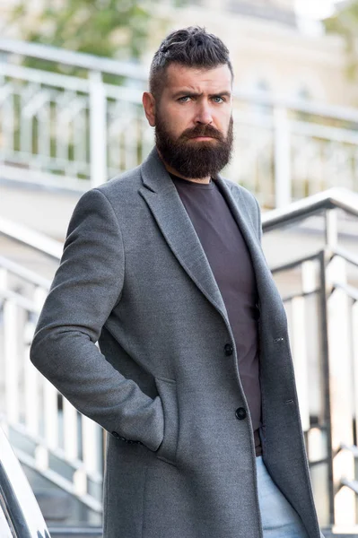 Urban fashion. Man bearded hipster stylish fashionable coat or jacket. Comfortable outfit. Hipster fashion model outdoors. Stylish casual outfit spring season. Menswear and male fashion concept