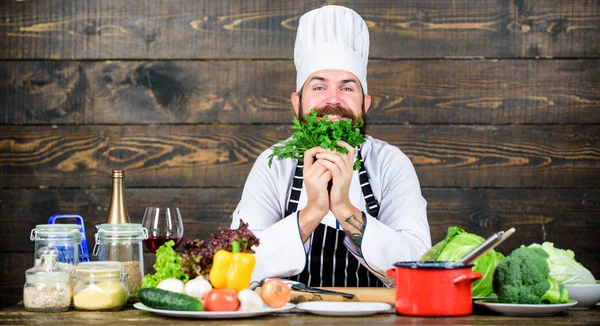 Man bearded hipster cooking fresh vegetables. Culinary recipe concept. Freshest possible ingredients. Chef use fresh organic vegetables for dish. Vegetarian meal. Organic food. Fresh ingredients only — Stock Photo, Image