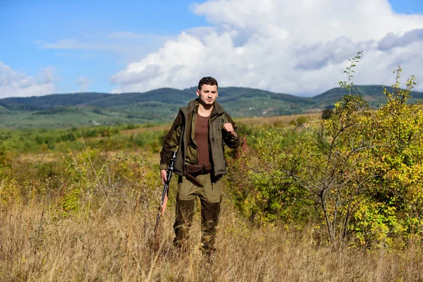 Stock image What you should have while hunting nature environment. Hunting equipment and safety measures. Man with rifle hunting equipment nature background. Make sure safe condition. Prepare for hunting