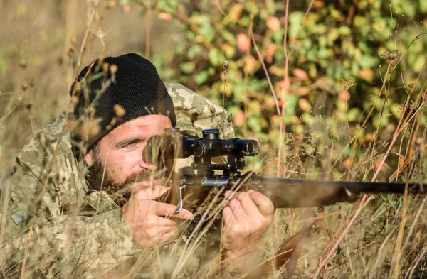 Man hunter with rifle gun. Boot camp. Bearded man hunter. Army forces. Camouflage. Military uniform fashion. Hunting skills and weapon equipment. How turn hunting into hobby. hiding — Stock Photo, Image