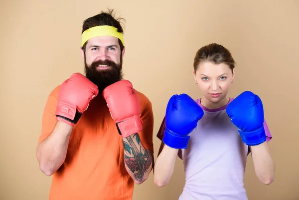 stock image Ready to fight. Man and woman in boxing gloves. Boxing sport concept. Couple girl and hipster practicing boxing. Sport for everyone. Amateur boxing club. Equal possibilities. Strength and power
