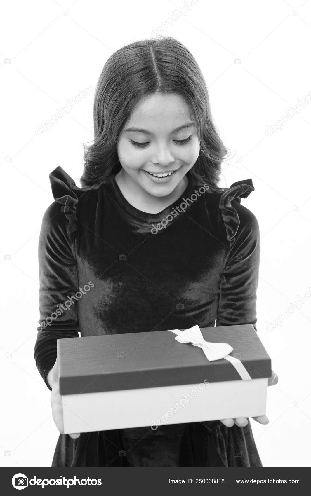 Kid Little Girl In Elegant Dress Curly Hairstyle Hold Gift Box