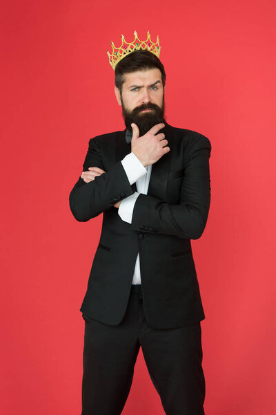 Elite society. Feeling superior. Man bearded guy in tuxedo golden crown symbol of monarchy. King ceremony. King attribute. Narcissistic king. Self confidence concept. Handsome hipster formal suit