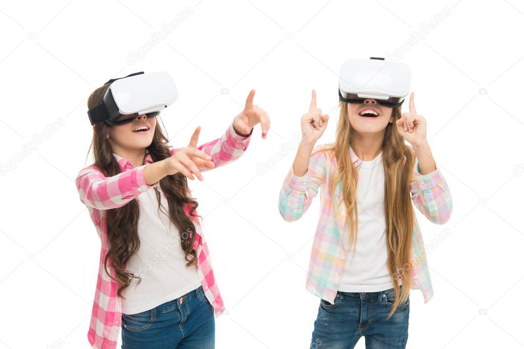 Play cyber game and study. Modern education. Alternative education technologies. Virtual education. Kids wear hmd explore virtual or augmented reality. Girls interact cyber reality. Game and fun