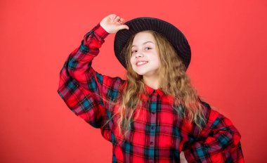 Enter acting academy. Girl artistic kid practicing acting skills with black hat. Acting school for children. Acting lessons guide children through wide variety of genres. Develop talent into career