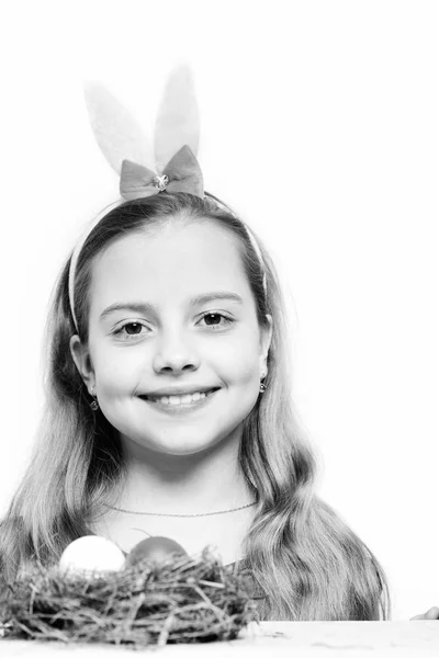 Small happy baby girl with easter eggs isolated on white — Stock Photo, Image