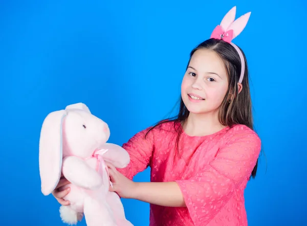 Playful beauty. Little girl with hare toy. Egg hunt. Family holiday. Happy easter. Spring party. Child in rabbit bunny ears. Capturing a happy moment. Ready to Easter. Easter preparations