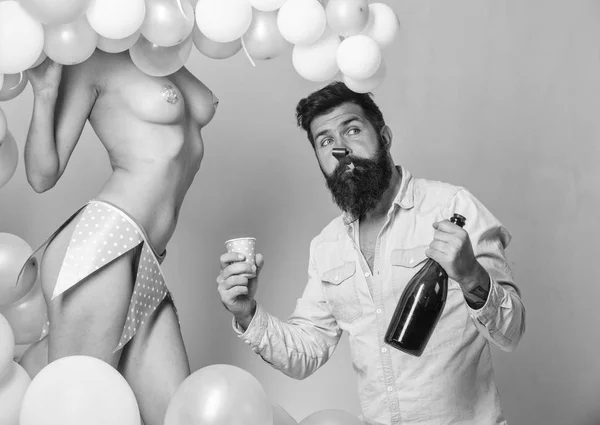 Idea for bachelor party. Party for adult. Birthday stripper for him. Strip dance for birthday surprise. Man bearded bachelor celebrate birthday. Nude sexy female strip dancer birthday surprise