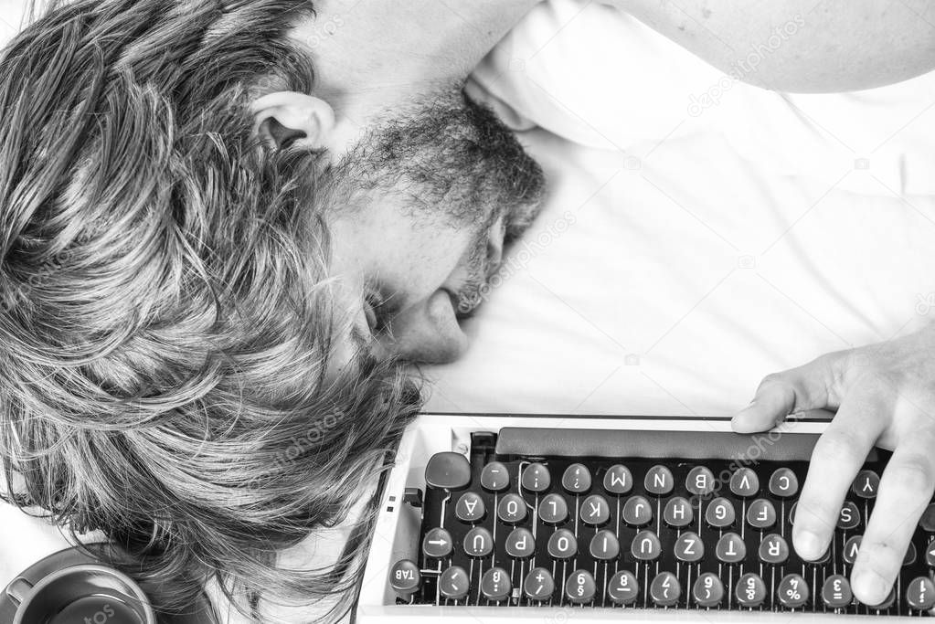 Man fall asleep. Writer used old fashioned typewriter. Author tousled hair fall asleep while write book. Workaholic fall asleep. Man with typewriter sleep. Deadline concept. Worked all night