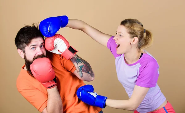 punching, sport Success. knockout and energy. couple training in boxing gloves. training with coach. sportswear. Fight. Happy woman and bearded man workout in gym. Our sport is other sport punishment