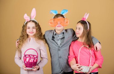 Children with little basket ready hunting for Easter eggs. Easter activity and fun. Friends having fun together on Easter day. Ready for eggs hunt. Group kids bunny ears accessory celebrate Easter clipart