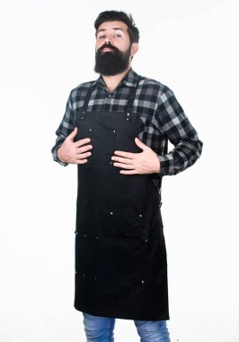 İş bağımlılığı. Hipster berber veya mutfakta çalışma rutin hazırlanıyor. Sakallı adam birden fazla cepli iş önlük giyiyor. İş bağımlısı. Rutin çalışma aktivitie