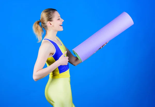 Staying fit and healthy. Sport mat equipment. Athletic fitness. Sporty woman training in gym. Happy woman workout with fitness mat. Health diet. Success. Strong muscles and power