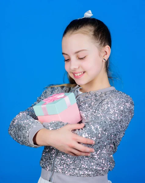 Happy birthday. Holiday celebration. Cheerful child. Little girl with gift. Surprise. Childrens day. Congratulation. Boxing day. Christmas shopping. Small girl with present box. birthday presen