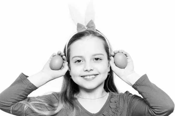Small happy baby girl with easter eggs isolated on white — Stock Photo, Image