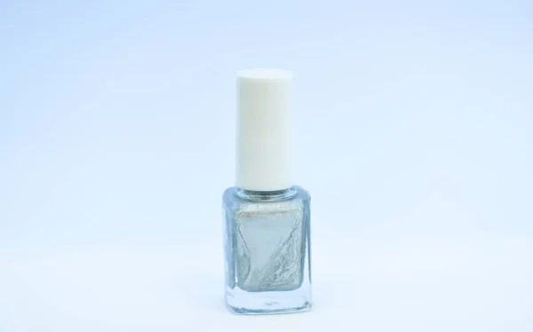 Garrafa de verniz de prego cor brilhante. Salão de manicure. Conceito de beleza e cuidado. Unha polonês fundo branco. Durabilidade e qualidade do revestimento de esmalte. Gel polonês tecnologia moderna. Escolha a cor — Fotografia de Stock