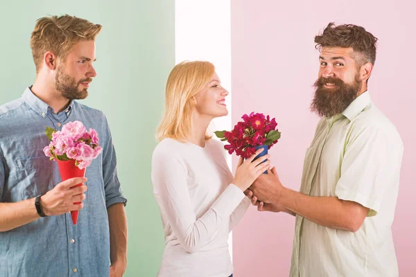 Men competitors with bouquets flowers try conquer girl. Girl smiling made her choice. Broken heart concept. Girl popular receive lot male attention. Woman happy takes bouquet flowers romantic gift — Stock Photo, Image