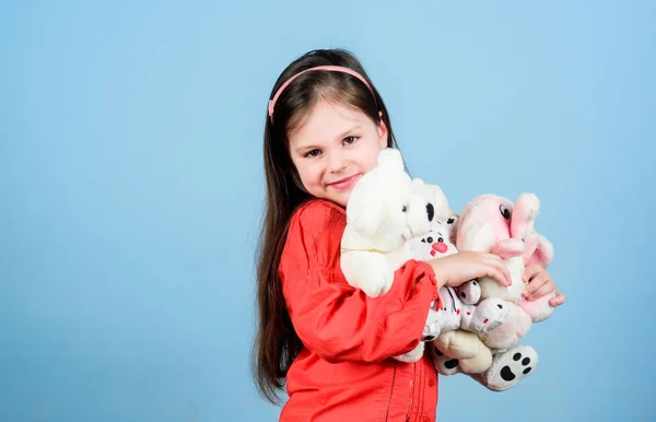 small girl with soft bear toy. child psychology little girl play game in playroom. happy childhood. Birthday. hugging teddy bear. toy shop. childrens day. Best friend. Moments of love and happiness
