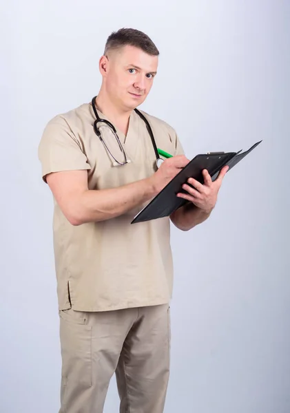 Medicine and health care. Private clinic. Professional doctor. Experienced doctor beige clothes on white background. Check health. Doctor career. Man doctor with stethoscope physician uniform