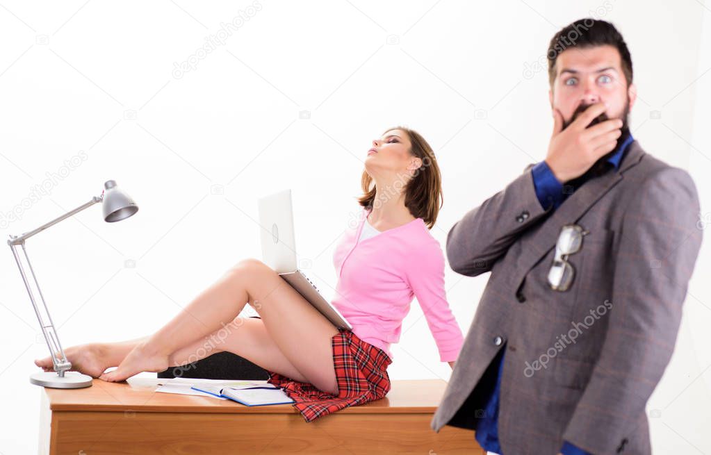 Nothing personal its just business. Sensual personal assistant relaxing on desktop in front of shocked boss. Sexy secretary using personal computer for business. Professional and personal growth