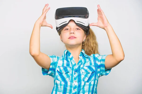 Little gamer concept. Child play virtual games with modern device. Explore virtual opportunity. Newest kids virtual reality games. Virtual reality is fun for all ages. Kid girl with vr glasses