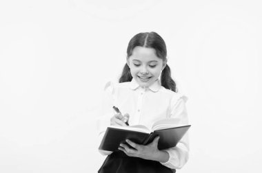 Notlar yapma. Çocuk okul üniformalı çocuk ödev yapmak. Çocuk kız okul tek tip kıyafet kitap ve kalem tutun. Kız şirin yazmak fikir notlar aşağı. Notlar hatırlamak. Kompozisyon ya da notlar yazmak. Kişisel zamanlama