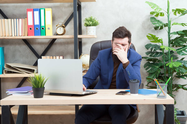 Failed deal. Falling stock prices. Man bearded boss sit office laptop. Manager solving business problems online. Business man failed. Risky business. Broker and financial indicators. Become bankrupt