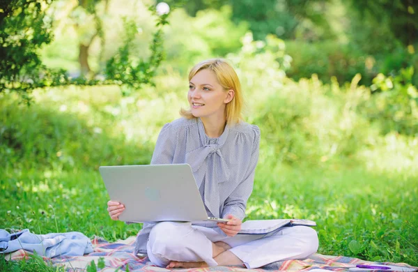 Business lady freelance work outdoors. Become successful freelancer. Woman with laptop sit on rug grass meadow. Online freelance career concept. Pleasant occupation. Guide starting freelance career