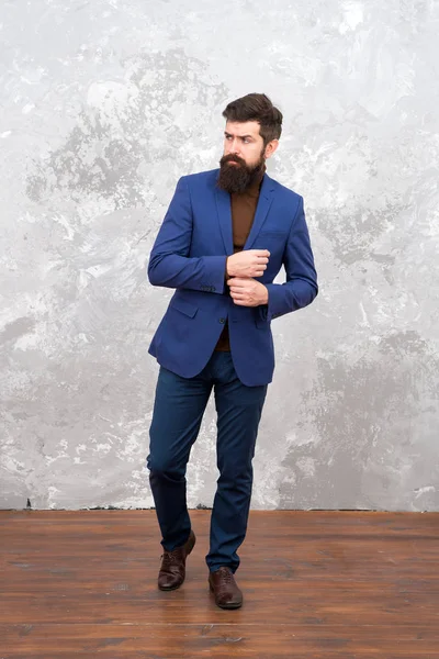 Brutal bearded hipster in formal suit. Male fashion model. Mature bearded businessman walking. Tailor or fashion designer. Modern life. elegant bearded man with beard. Business professionals